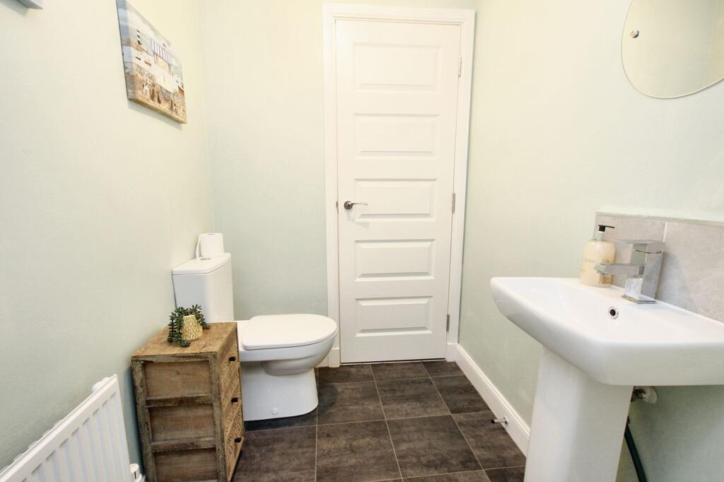 Lower Level Wc/Utility Cupboard