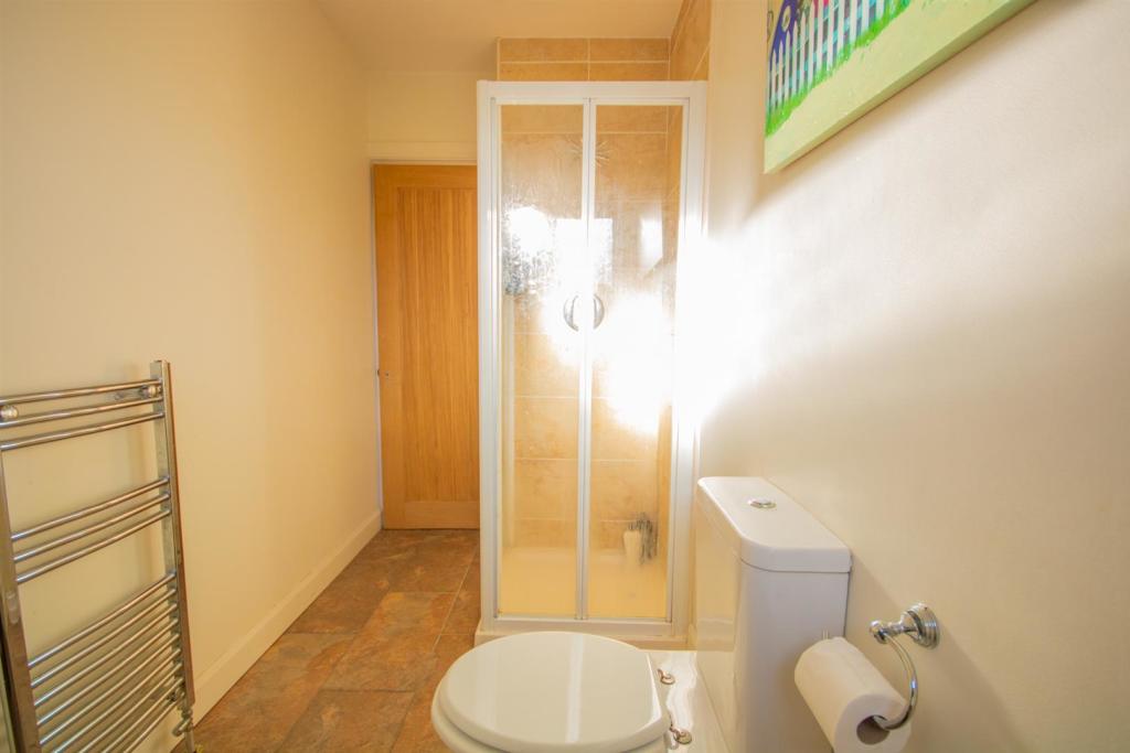 EN-SUITE SHOWER ROOM TO BEDROOM ONE