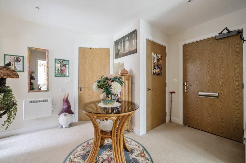 Entrance hall with storage cupboard
