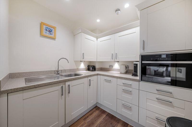 Kitchen with built-in appliances