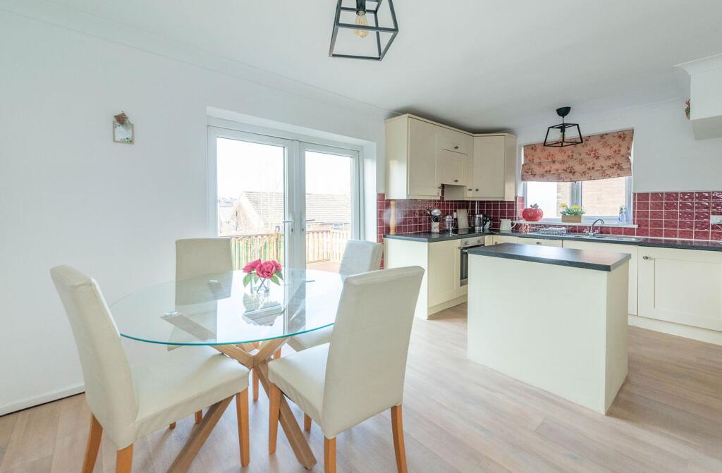 SITTING ROOM AND DINING KITCHEN