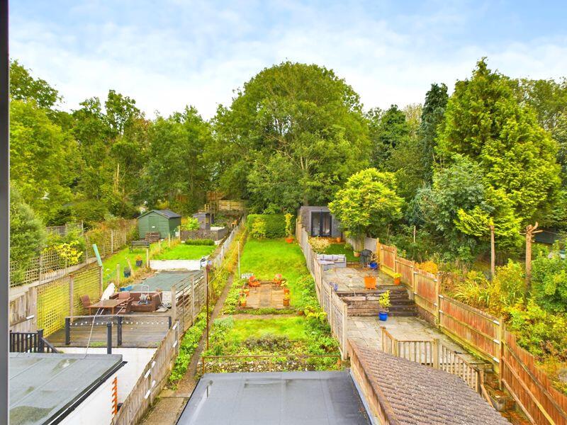 REAR GARDEN VIEW FROM BEDROOM ONE