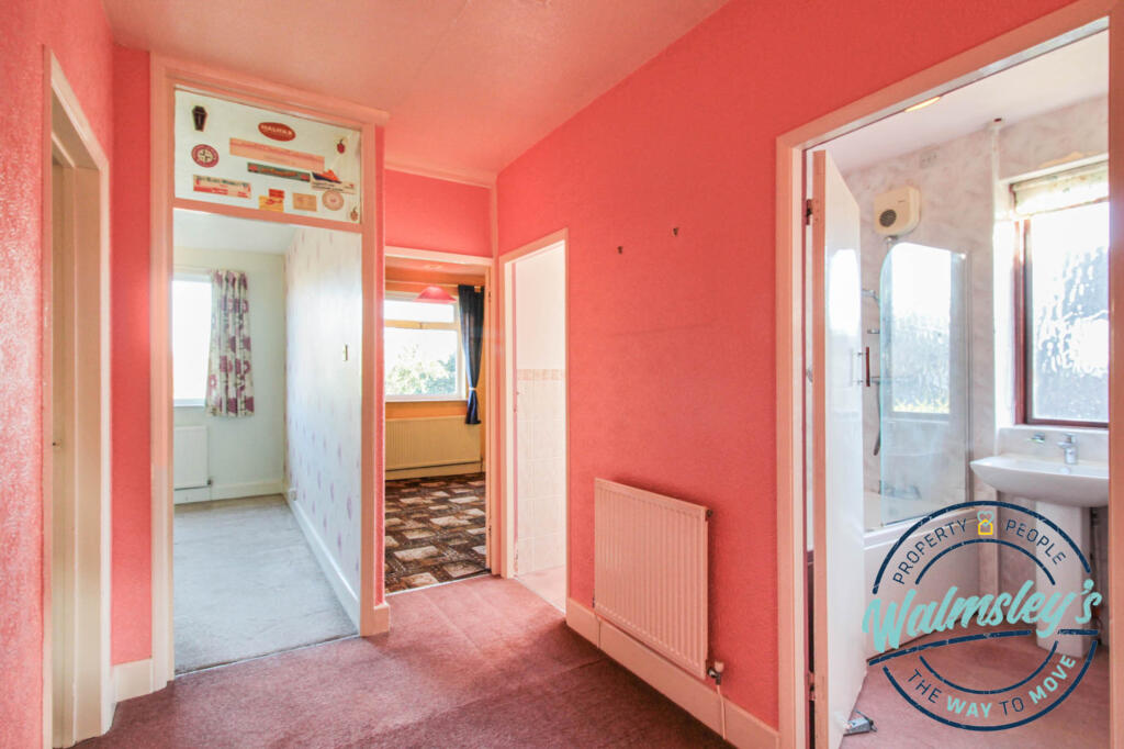 Landing with doors to bathroom &amp; cloakroom