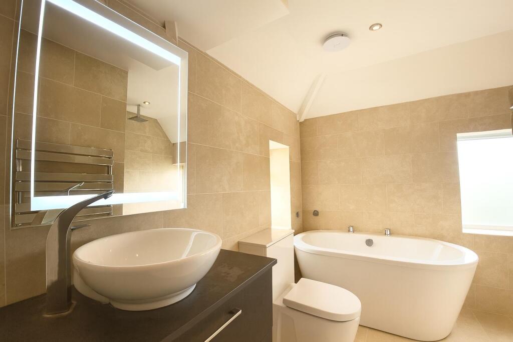 FINAL BRIGHTENED BATHROOM.jpeg