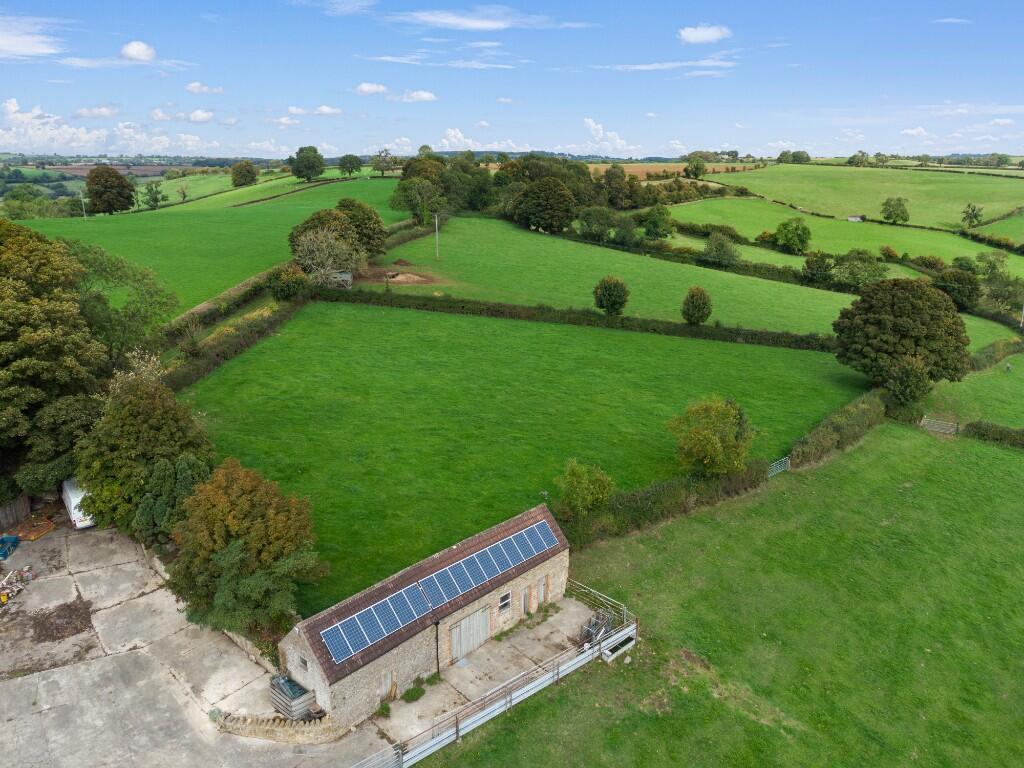 Barn and paddocks