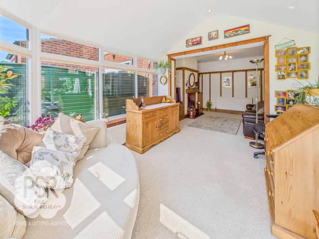 Open-Plan Conservatory and Sitting Room