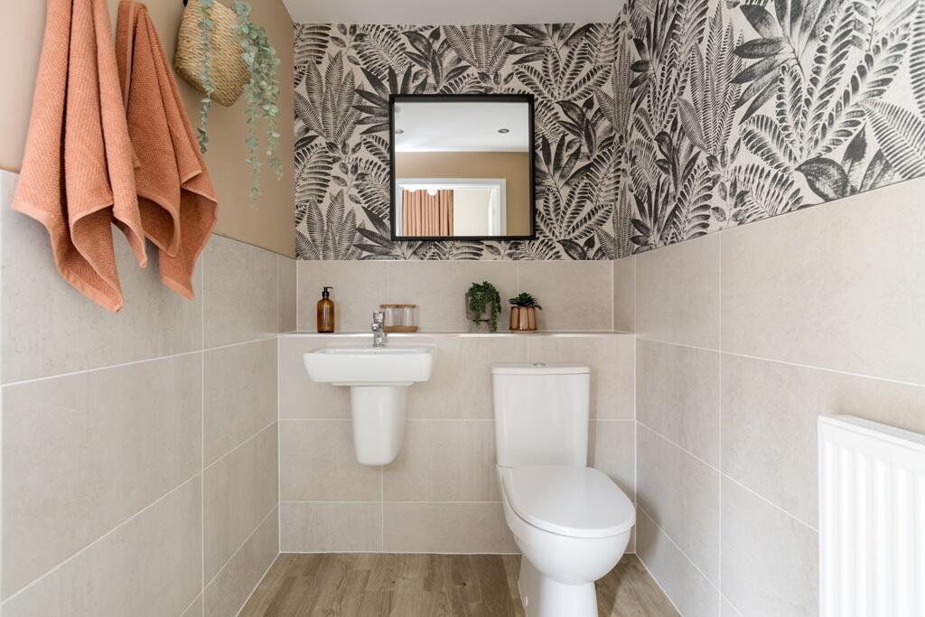 A handy downstairs toilet sits off the ktichen/diner
