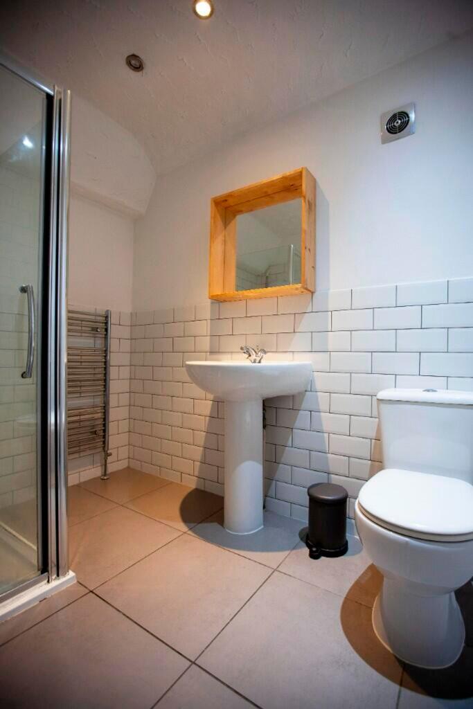 A modern and well-maintained bathroom featuring...