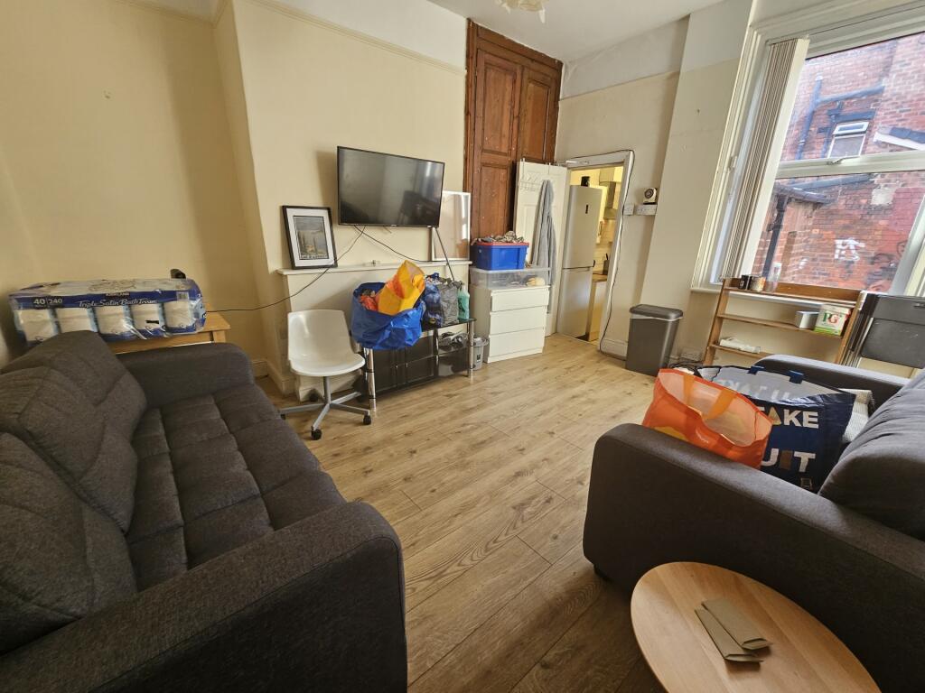 A cozy and inviting living room featuring two c...