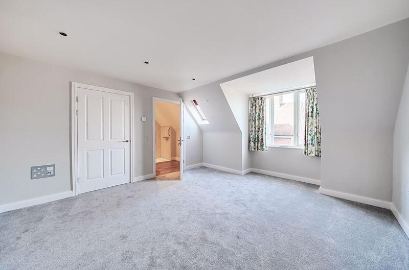 First bedroom with ensuite shower and...