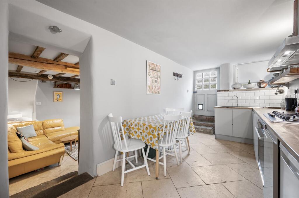 Kitchen towards front door and Sitting Room.jpg