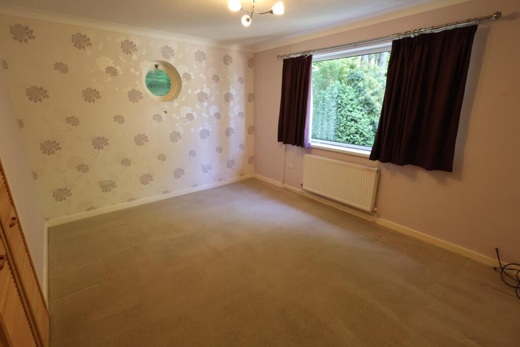 BEDROOM FIVE/SITTING ROOM