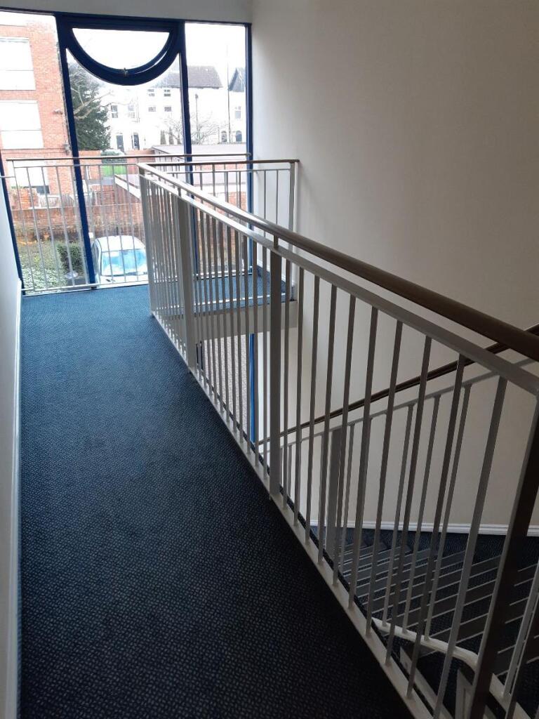 LANDING OUTSIDE ENTRANCE TO FLAT