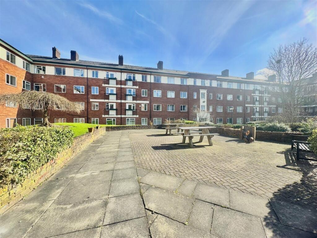Spacious and bright exterior view of a well-mai...