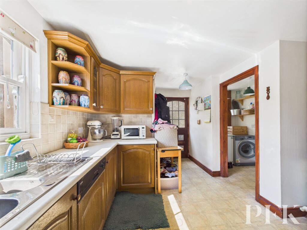 Kitchen looking to utility room