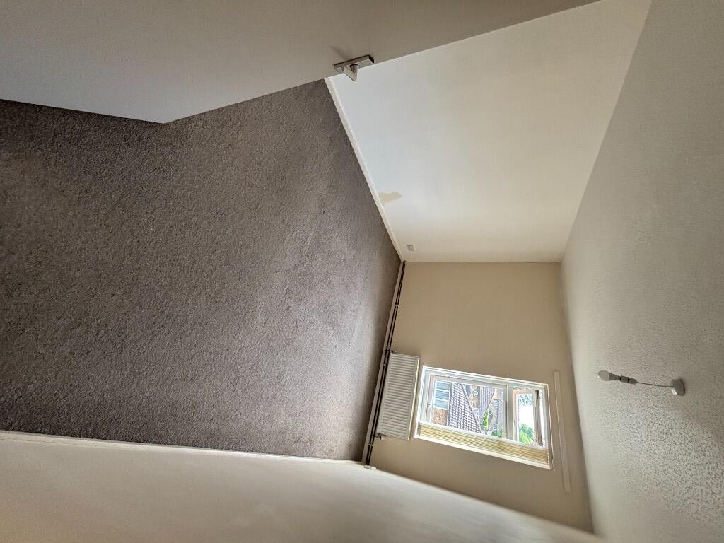 Bedroom with carpet