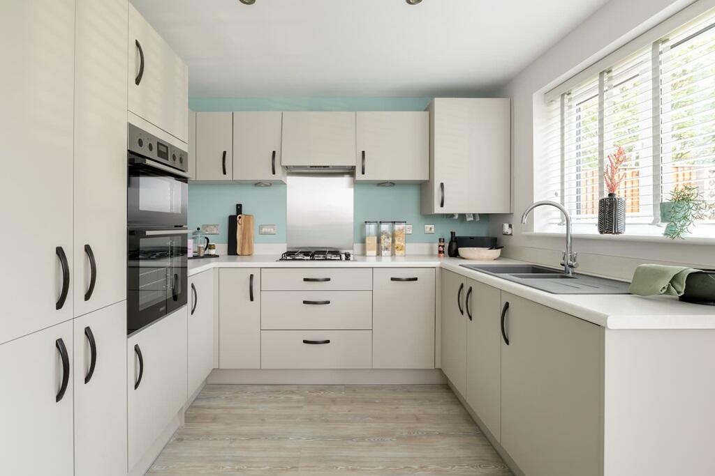 Contemporary fitted kitchen with lots of storage space