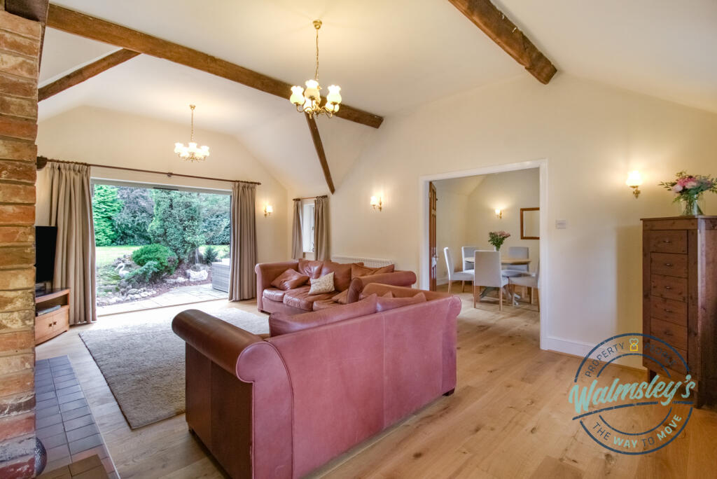 Sitting room with French doors to reception hallwa