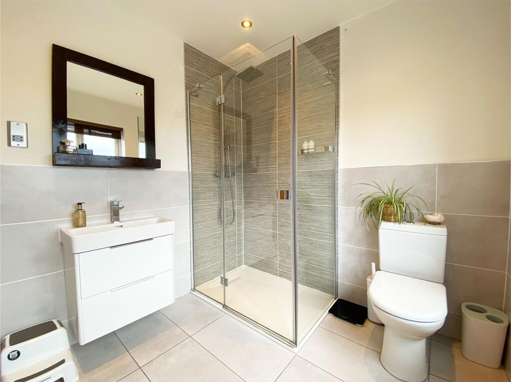 BEDROOM ONE EN-SUITE SHOWER ROOM