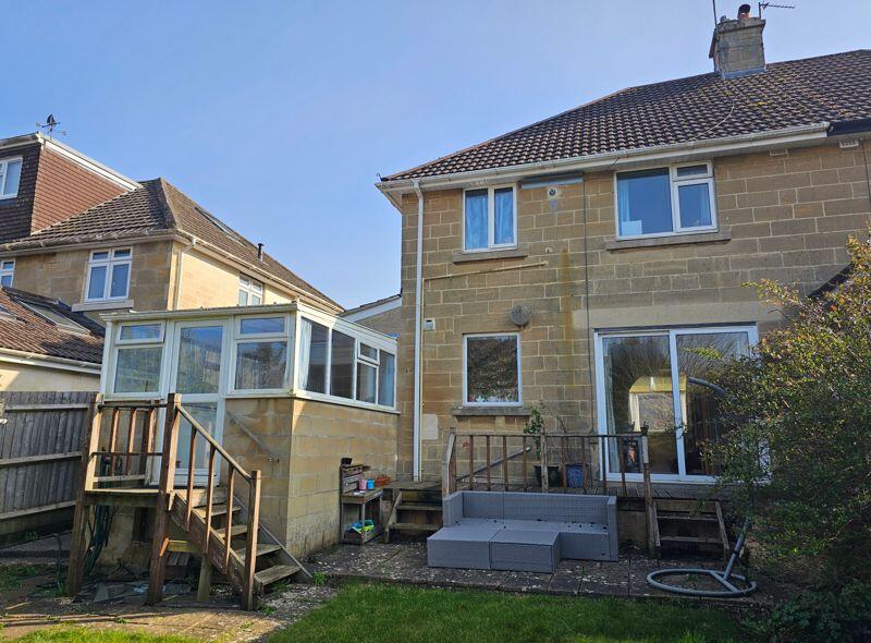 Rear garden to house