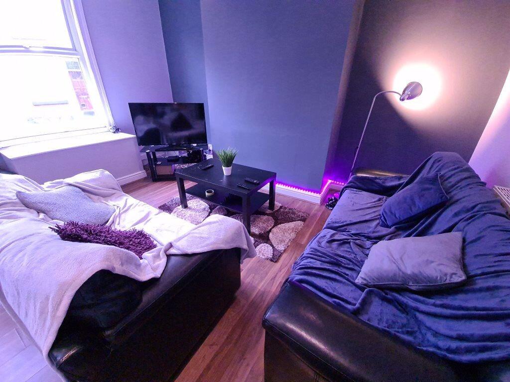 A cozy living room featuring two comfortable so...