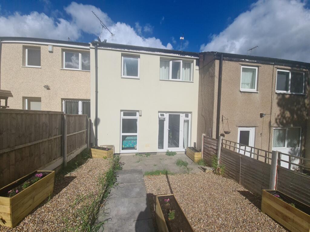 A well-maintained and spacious garden area with...