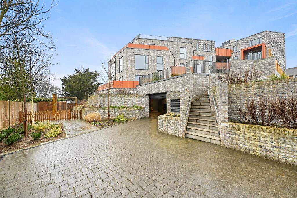 Wrealty - Exteriors, Bejoux Court - Garage Entranc