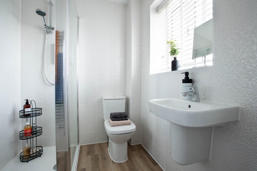 The master bedroom includes an en suite, a private sanctuary for a refreshing start or a relaxing e