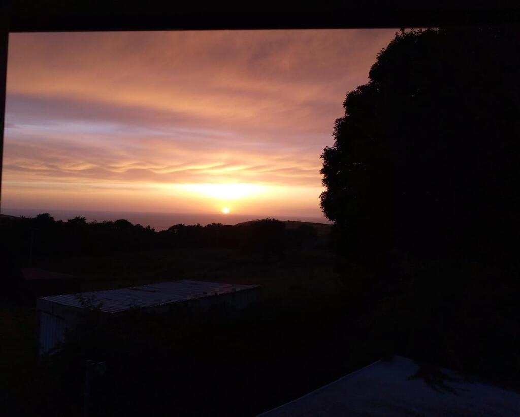 Sunset distant sea view from landing