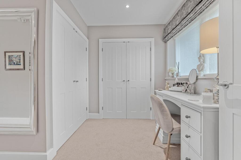 GROUND FLOOR MASTER SUITE DRESSING ROOM.jpg