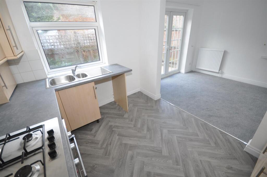 Kitchen into dining room.JPG