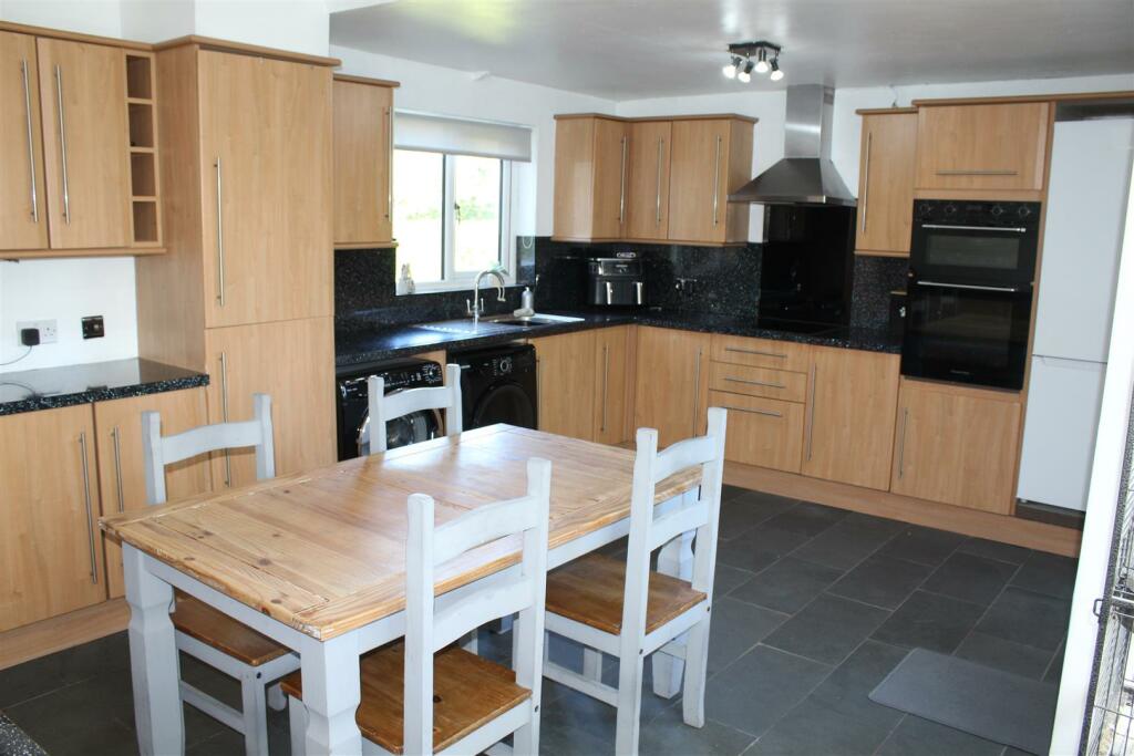 KITCHEN AND DINING ROOM