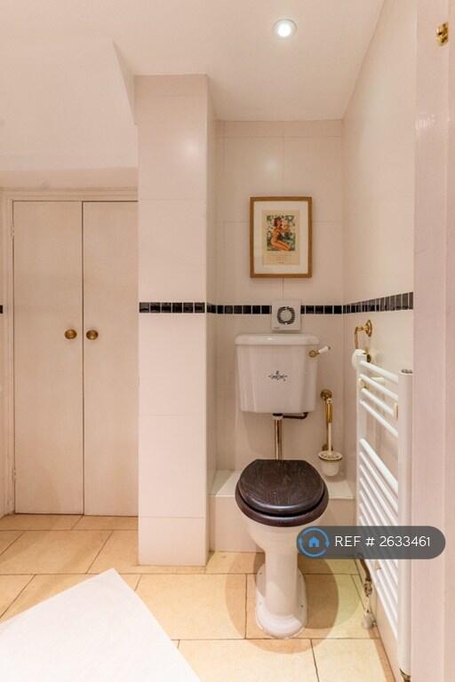 Downstairs Shower Room w Airing Cupboard