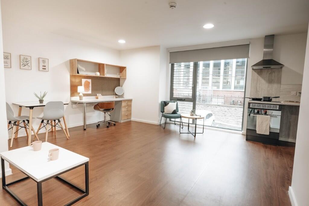 Bright and spacious contemporary living room fe...