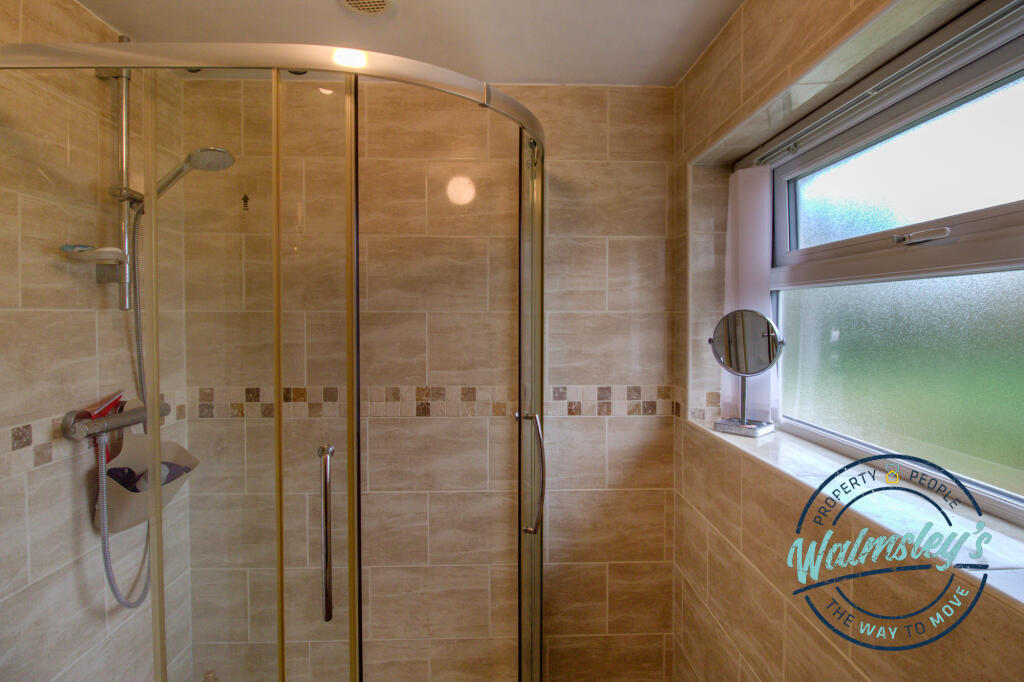 1st floor fully tiled shower room