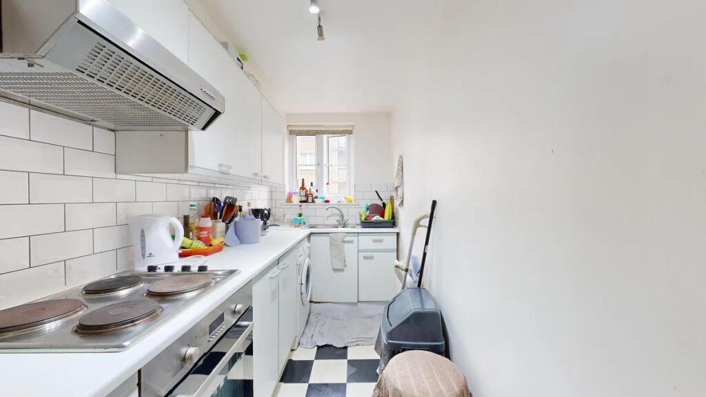 Bright and functional kitchen featuring a class...