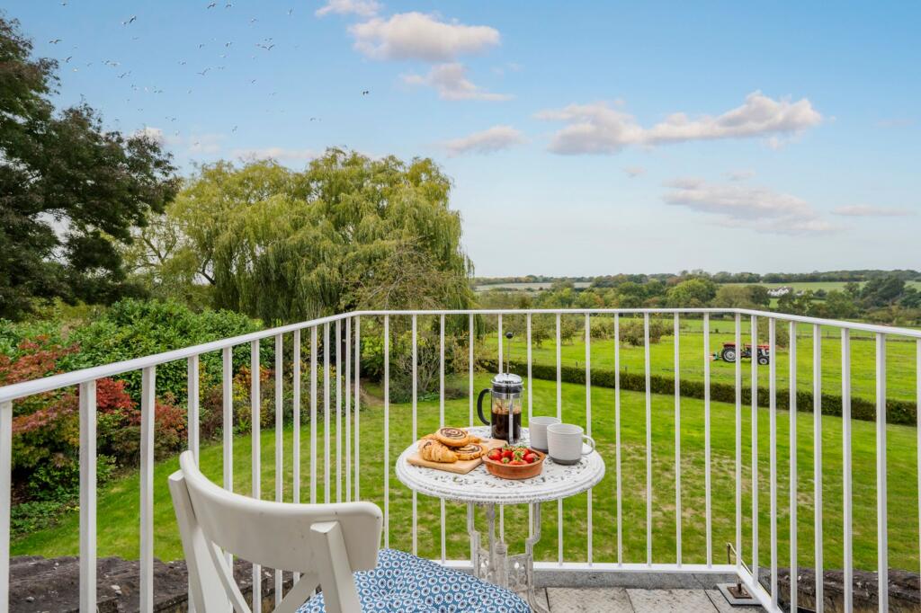 Balcony with Orchard Views