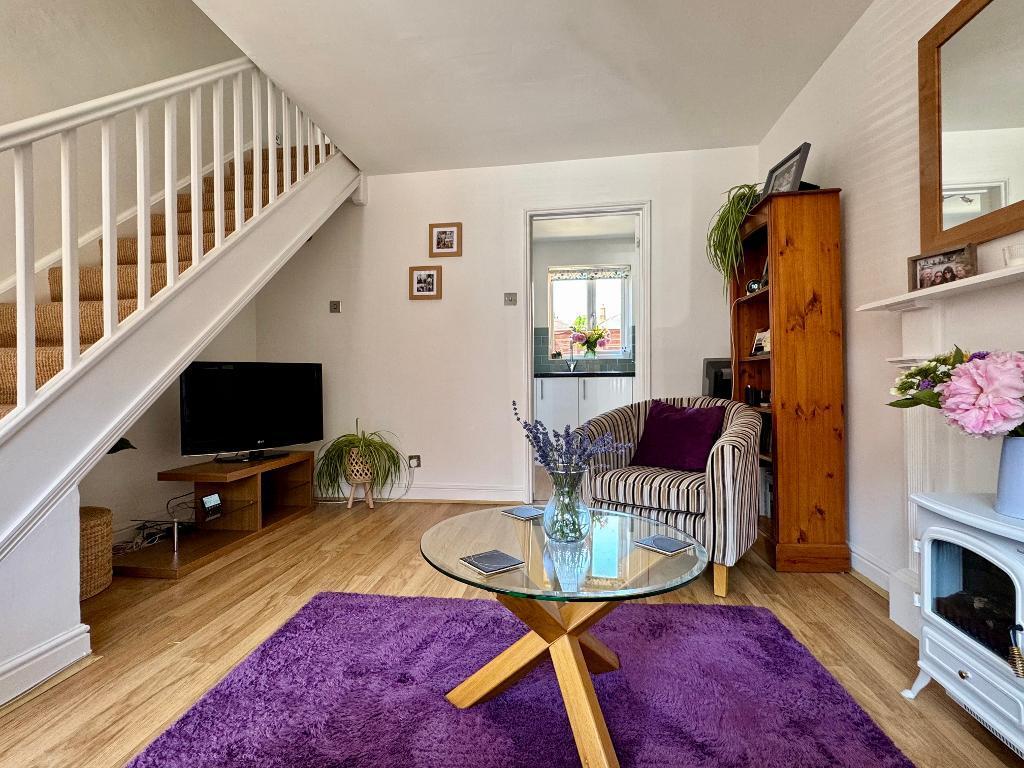 Sitting room with TV area (under stairs)