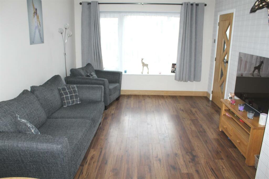 LIVING ROOM AND DINING AREA