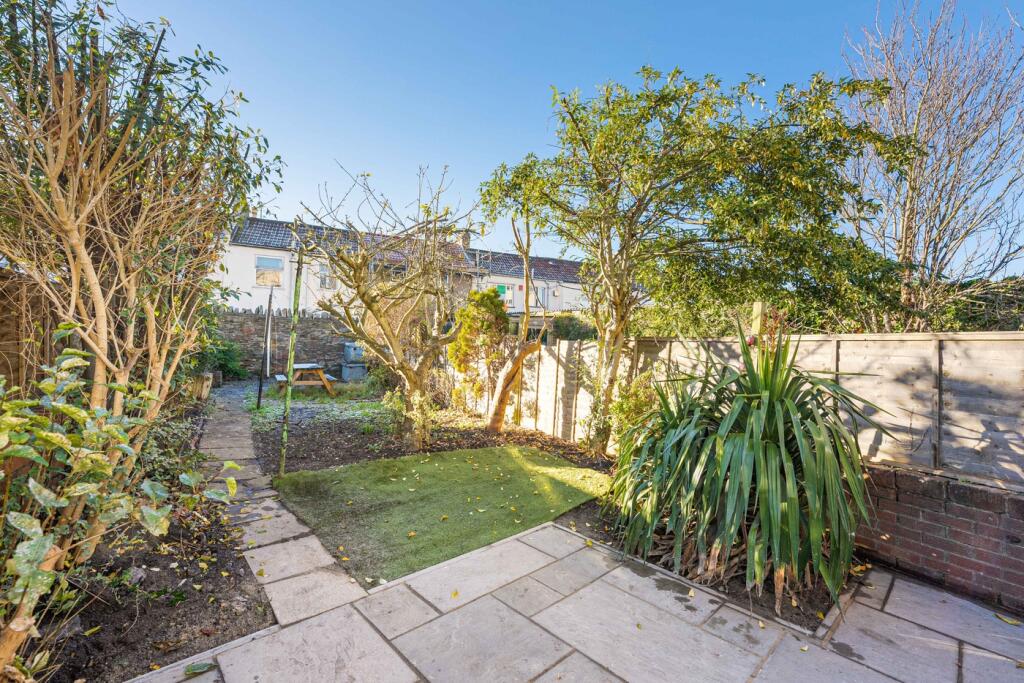 A beautifully maintained garden with ample spac...