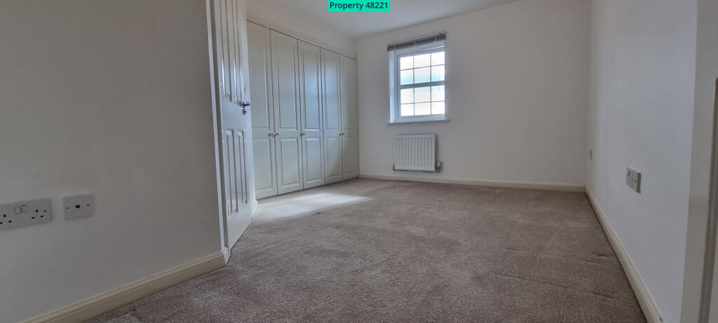 Master bedroom with ensuite and built in wardrobes