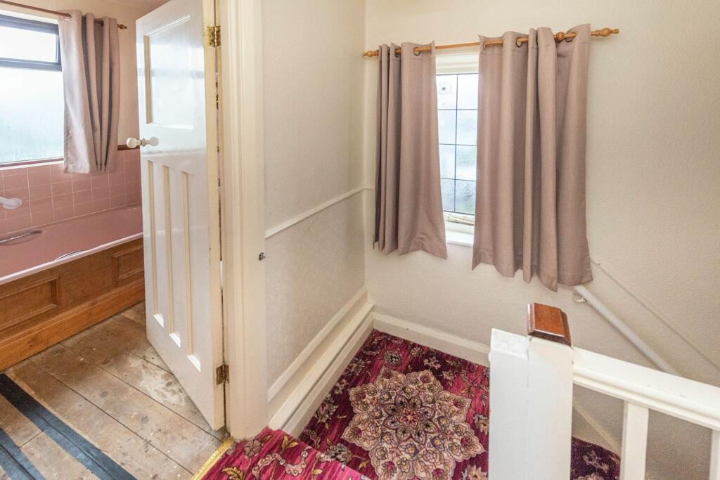 ENTRANCE HALLWAY AND LANDING