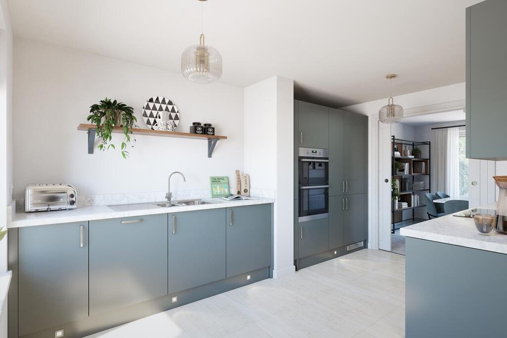 The modern kitchen leads through toe the dining area, perfect for you to entertain friends and fami