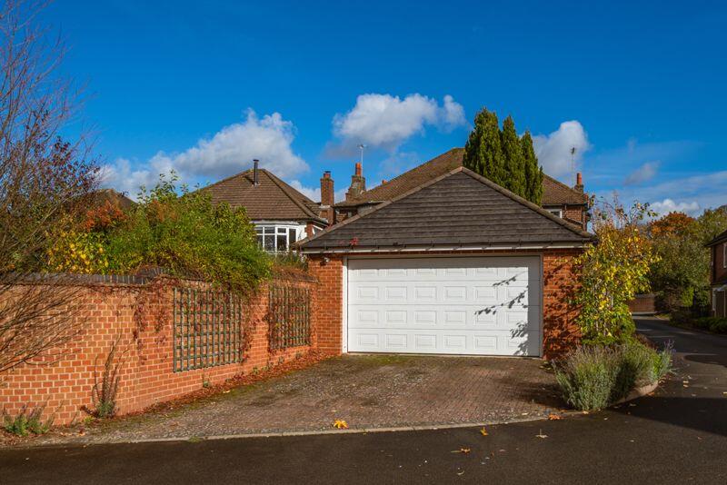 REAR DOUBLE GARAGE &amp; DRIVEWAY