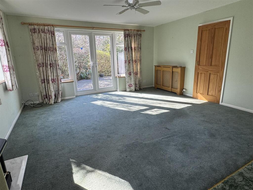 LIVING ROOM/BEDROOM FOUR: