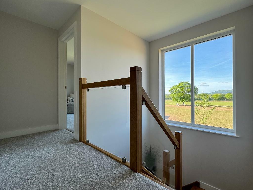 Landing &amp; door to main bedroom