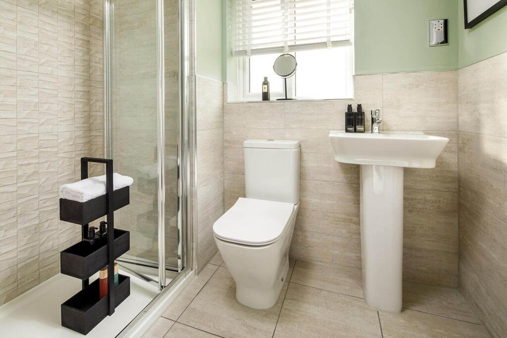 Bedroom 1 also host a private en suite shower room