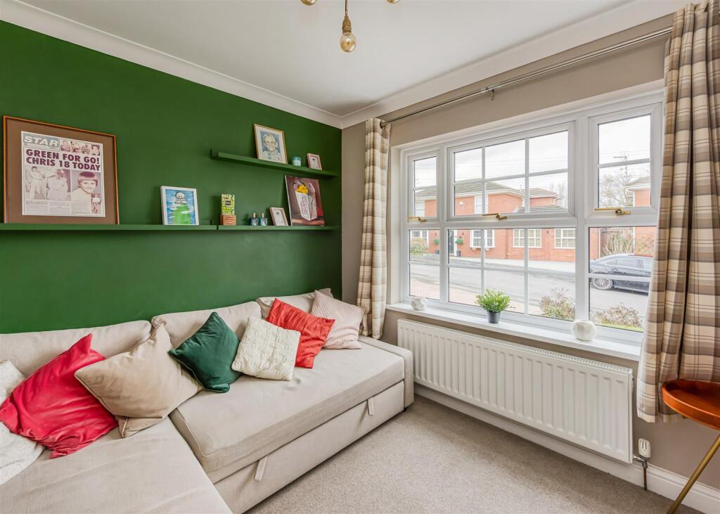 2 Heath House Drive-sitting room.jpg