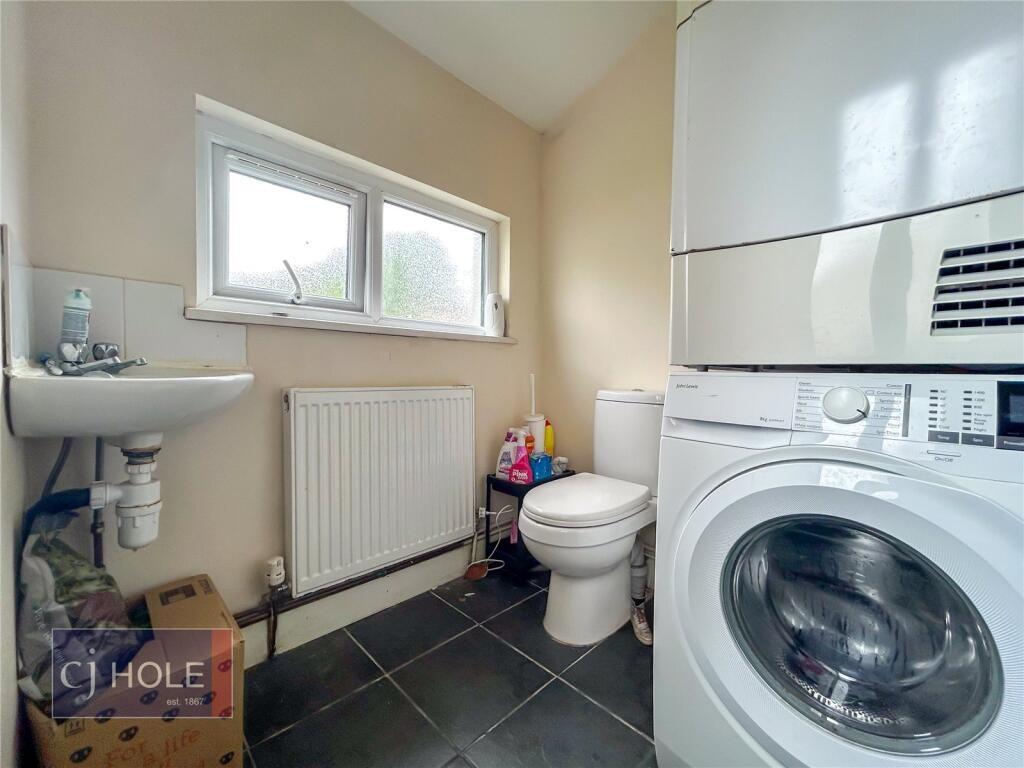 A clean and functional bathroom featuring a was...
