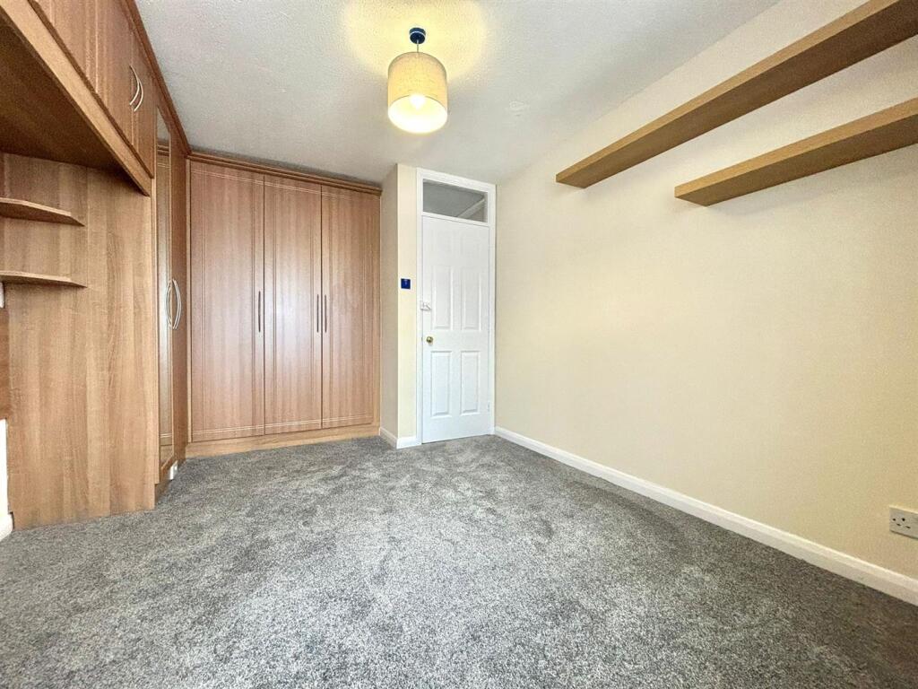 Bedroom 1 shot 2.jpeg